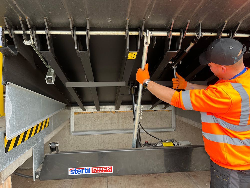 Stertil Stokvis performing dock leveller maintenance